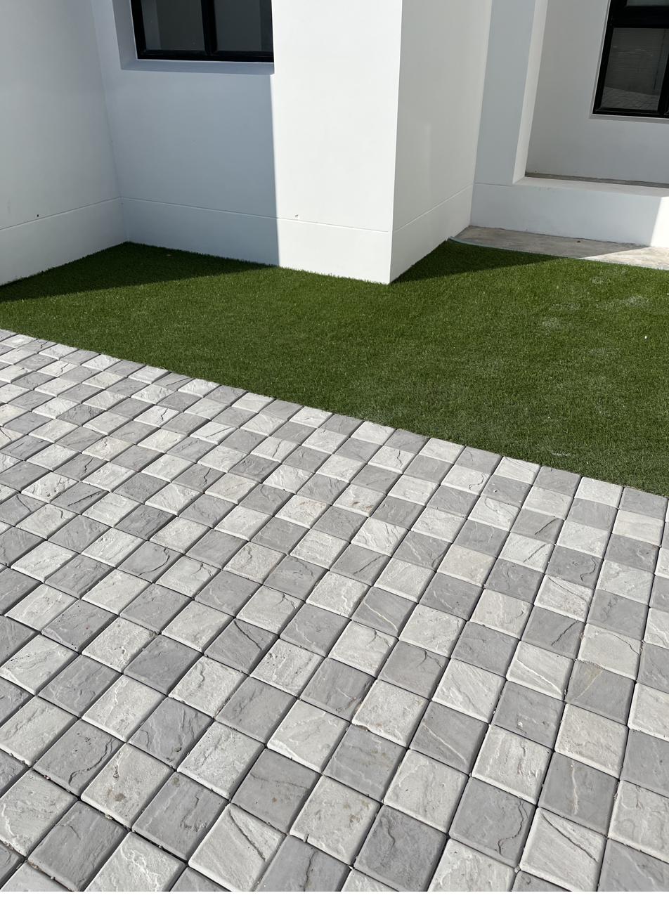 SanStone cobbles laid in a checkerboard pattern