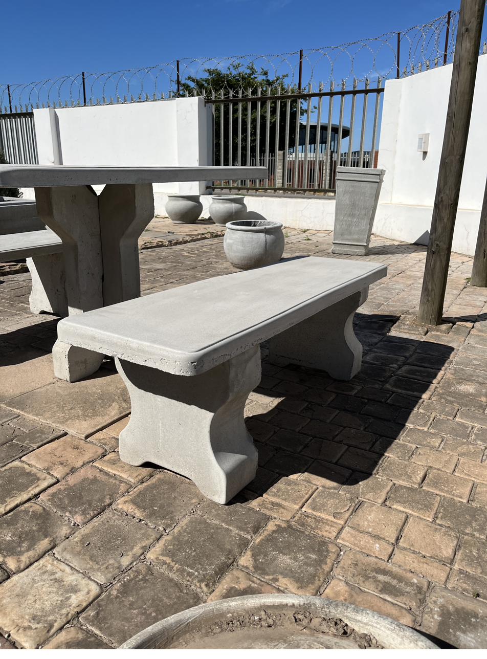 A cement table and bench set