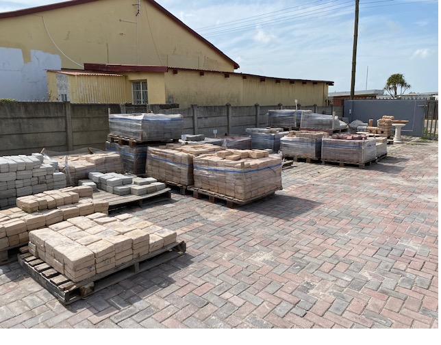 Pallets of SanStone stock in the factory yard