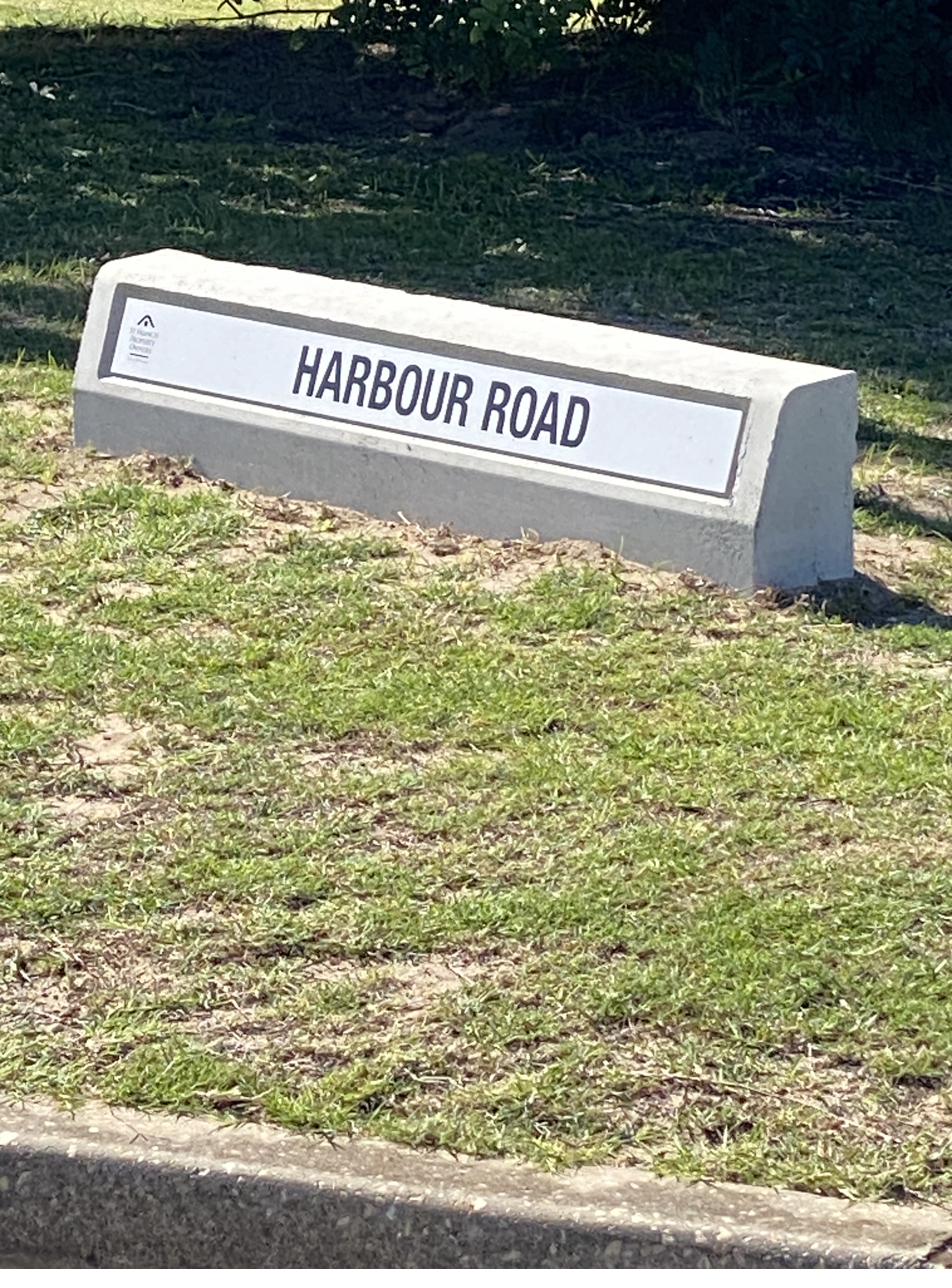 A cast concrete street-name sign in St Francis Bay